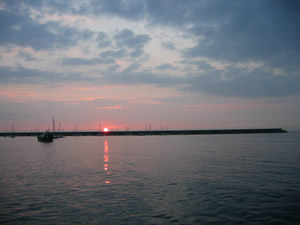 barnacle-alderney Sunset over Braye harbour, Alderney