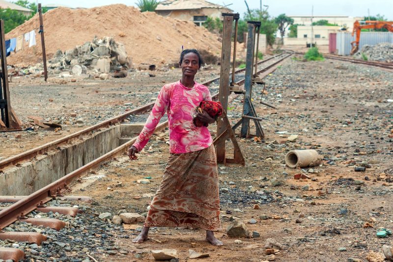 Massawa lady by the train track