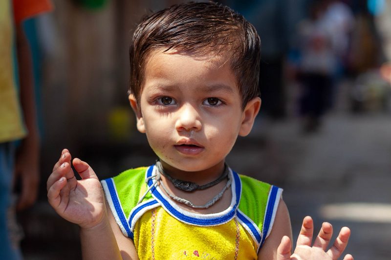 child portrait in dharavi slum, india