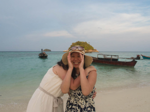 Shy girls in floppy sunhats are ubiquitous in this part of the world