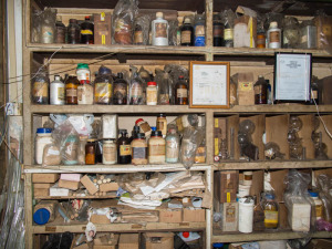 Stacked shelves of acids and chemicals