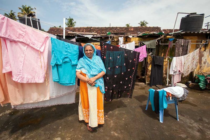 Muslim woman with her washing in Fort Kochi