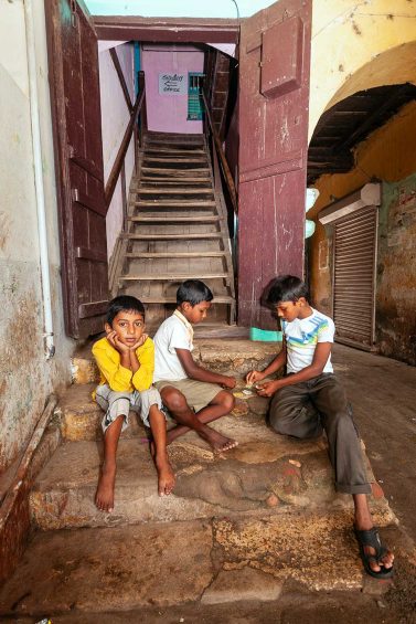 boys playing on the steps, Fort Cochin
